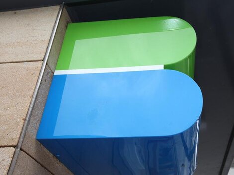 A modern, colorful logo consists of green and blue elements. It is clear and stylized, ideal for a striking external representation.