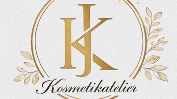 An elegant logo for a cosmetics studio. It features the letters "K" and "K" in gold, framed by stylish plant motifs.