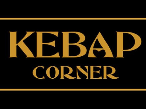 A black sign with golden lettering. The text says "KEBAP CORNER".