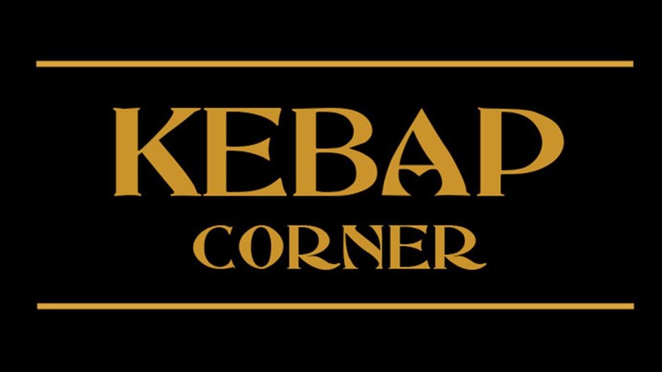 A black sign with golden lettering. The text says "KEBAP CORNER".