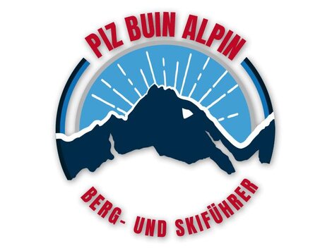 A logo of Piz Buin Alpin featuring a stylized mountain and sun rays. The text around the logo provides information about mountain and ski tours.